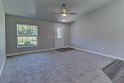 Great Room Facing Front Door from Kitchen